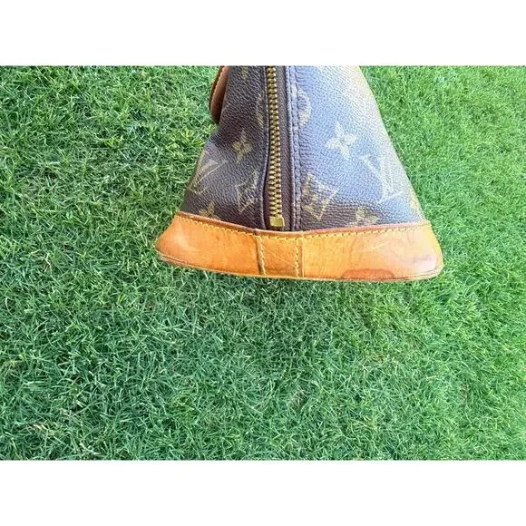 Louis Vuitton Alma Monogram Canvas Handbag Vintage Authentic Lock